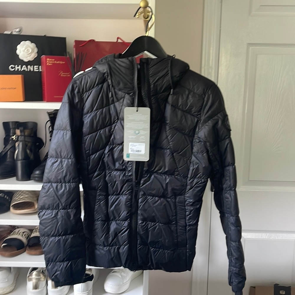 Canada Goose Abbot jacket size medium black with black logo.  NEW WITH TAGS